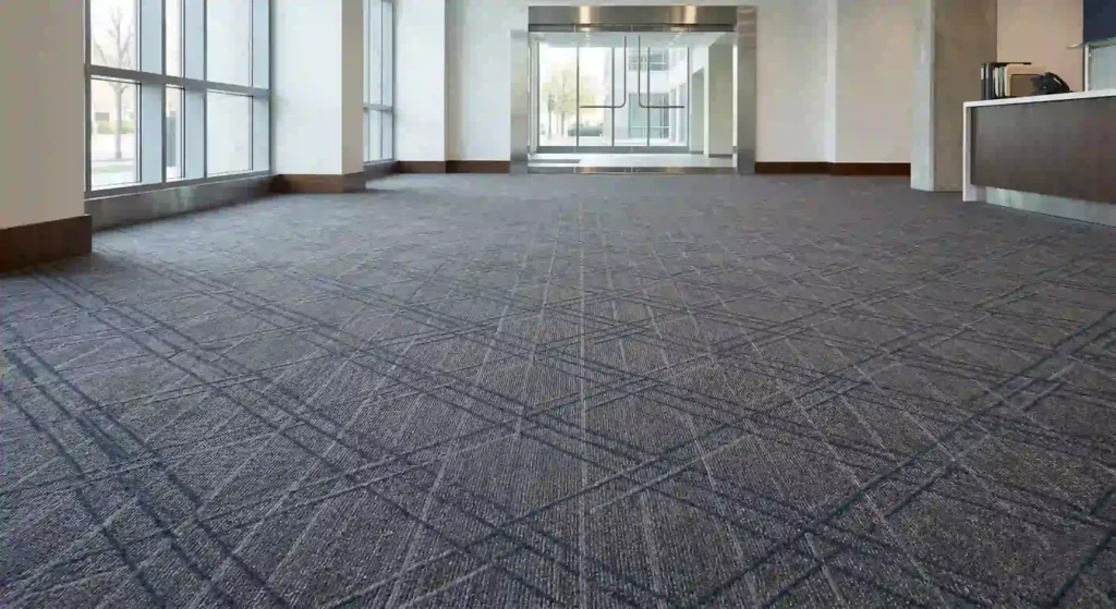 clean, patterned carpet surface in an office or commercial environment (no people, no equipment).